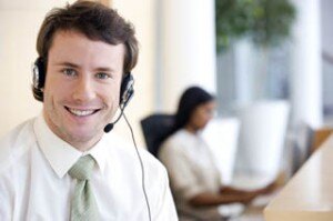 Office Worker with Headset and Computer